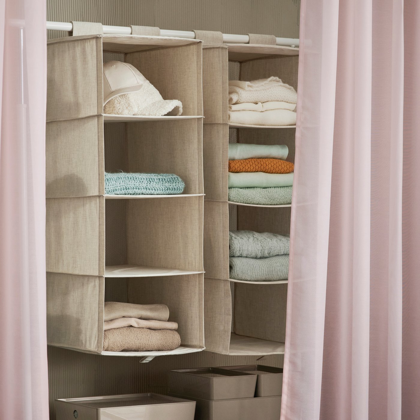 A textile/beige PURRPINGLA hanging storage w 4 compartments