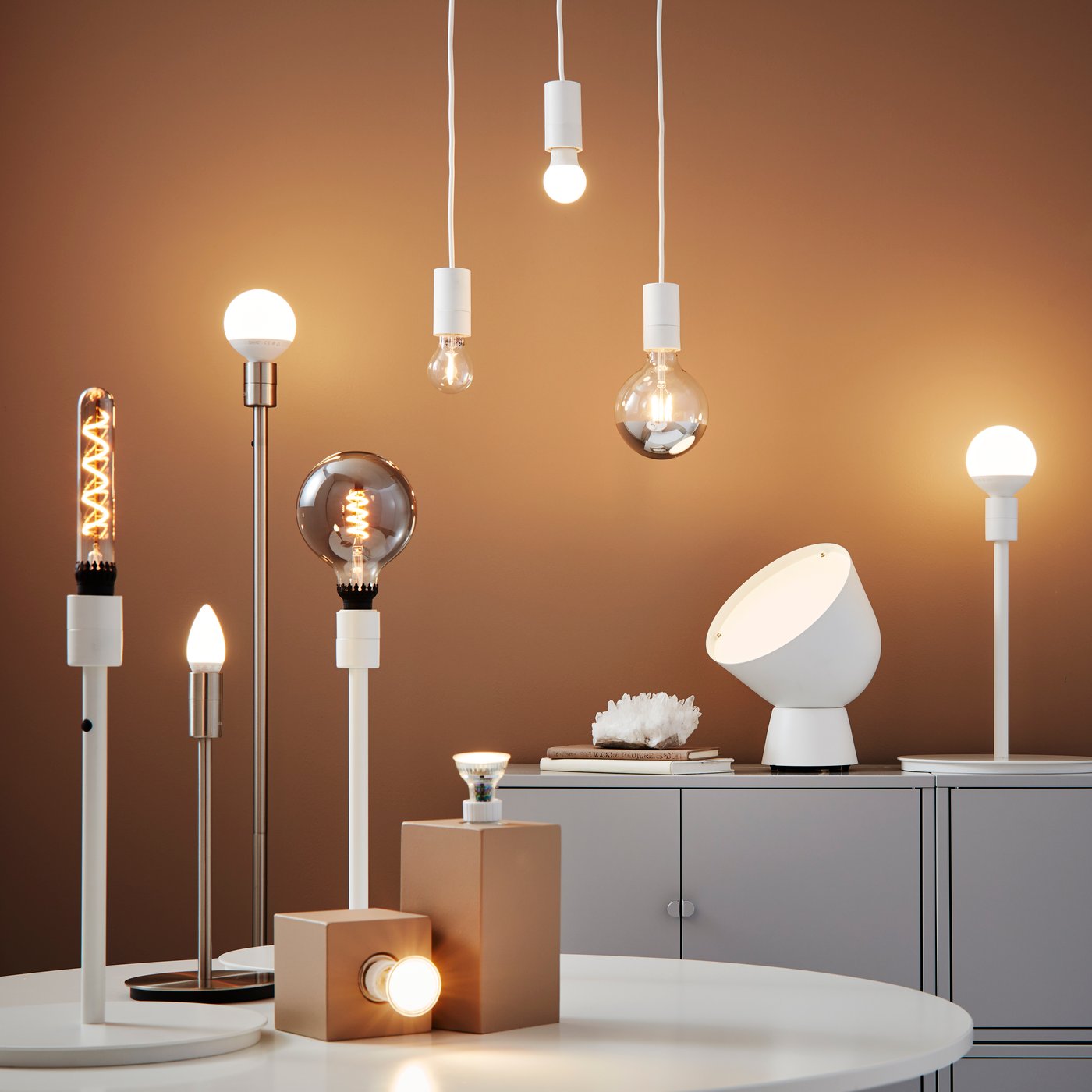 A dimmable/tube-shaped grey glass ROLLSBO LED bulb E27 200 lumen