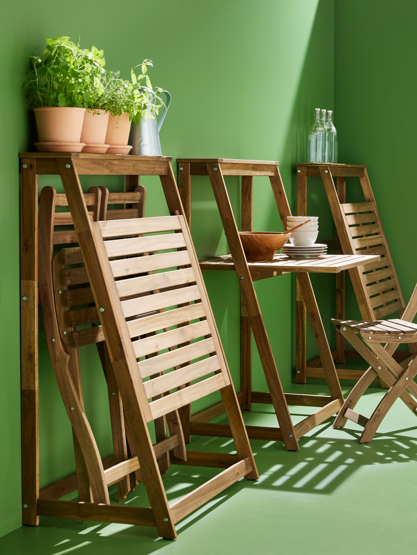 A brown DJUPÖN folding table