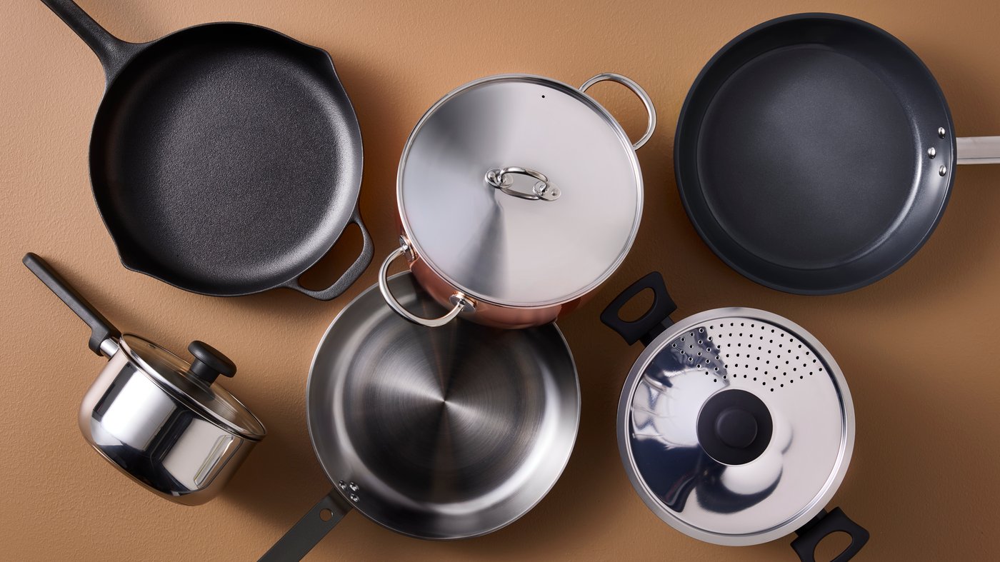 A clear glass/stainless steel MIDDAGSMAT saucepan with lid