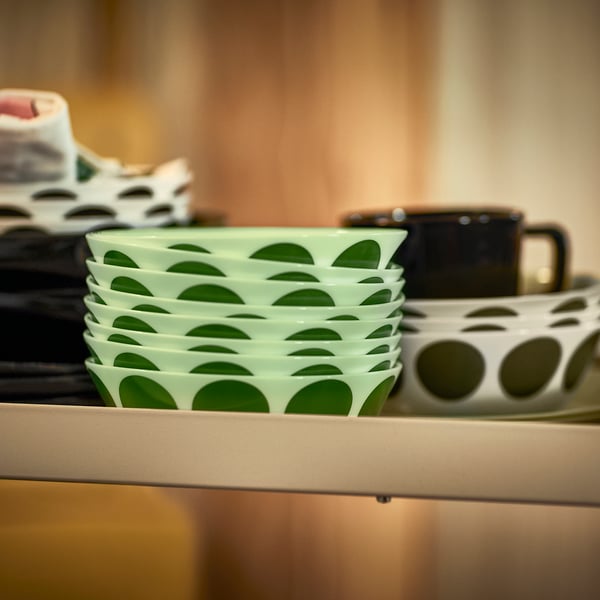 A light green green/dot pattern OFTAST bowl