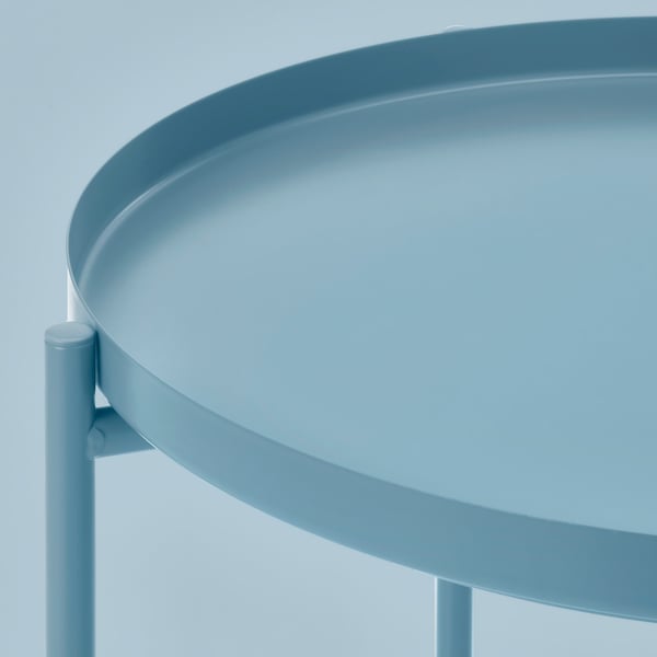 A light blue GLADOM tray table