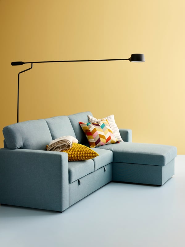 A Tibbleby light grey-turquoise BÅRSLÖV 3-seat sofa-bed with chaise longue