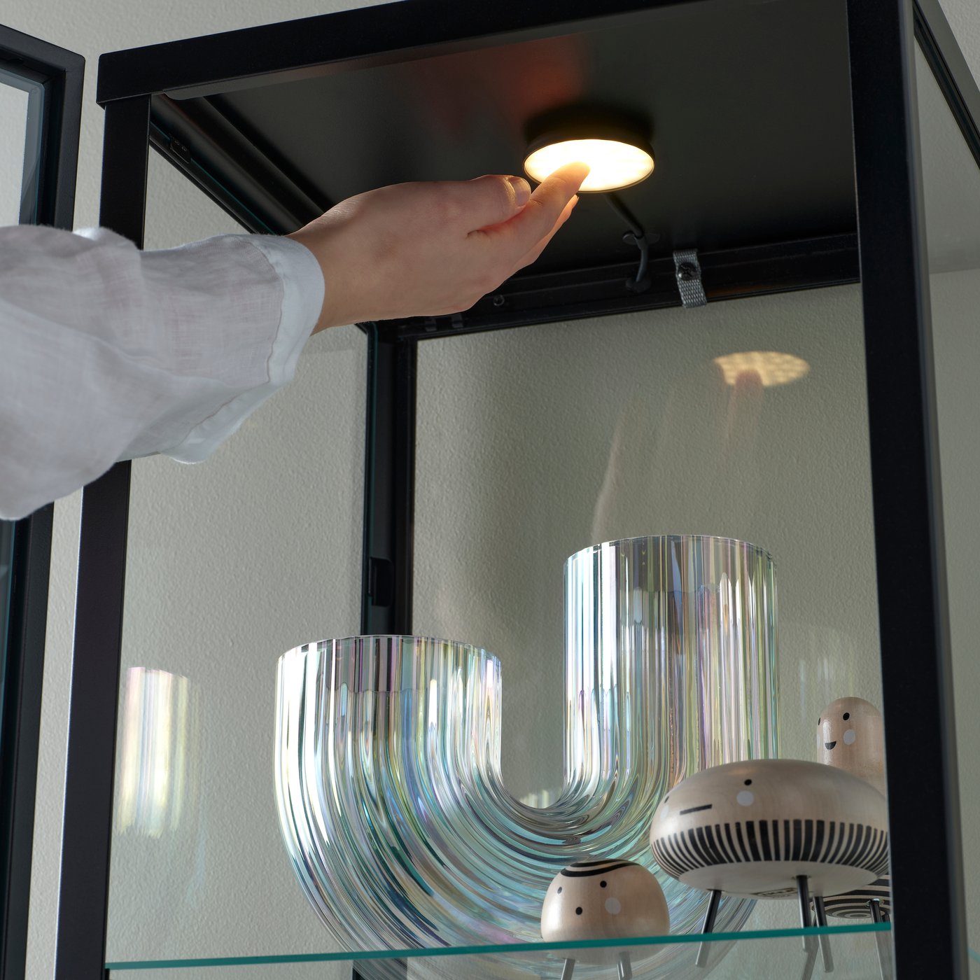 A black STRIMSÄV LED spotlight