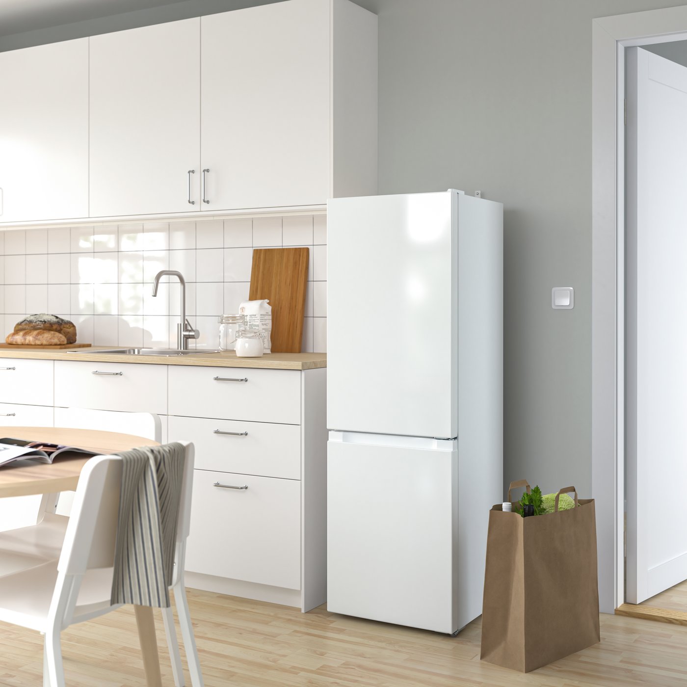 A freestanding/white LAGAN fridge/freezer in the kitchen