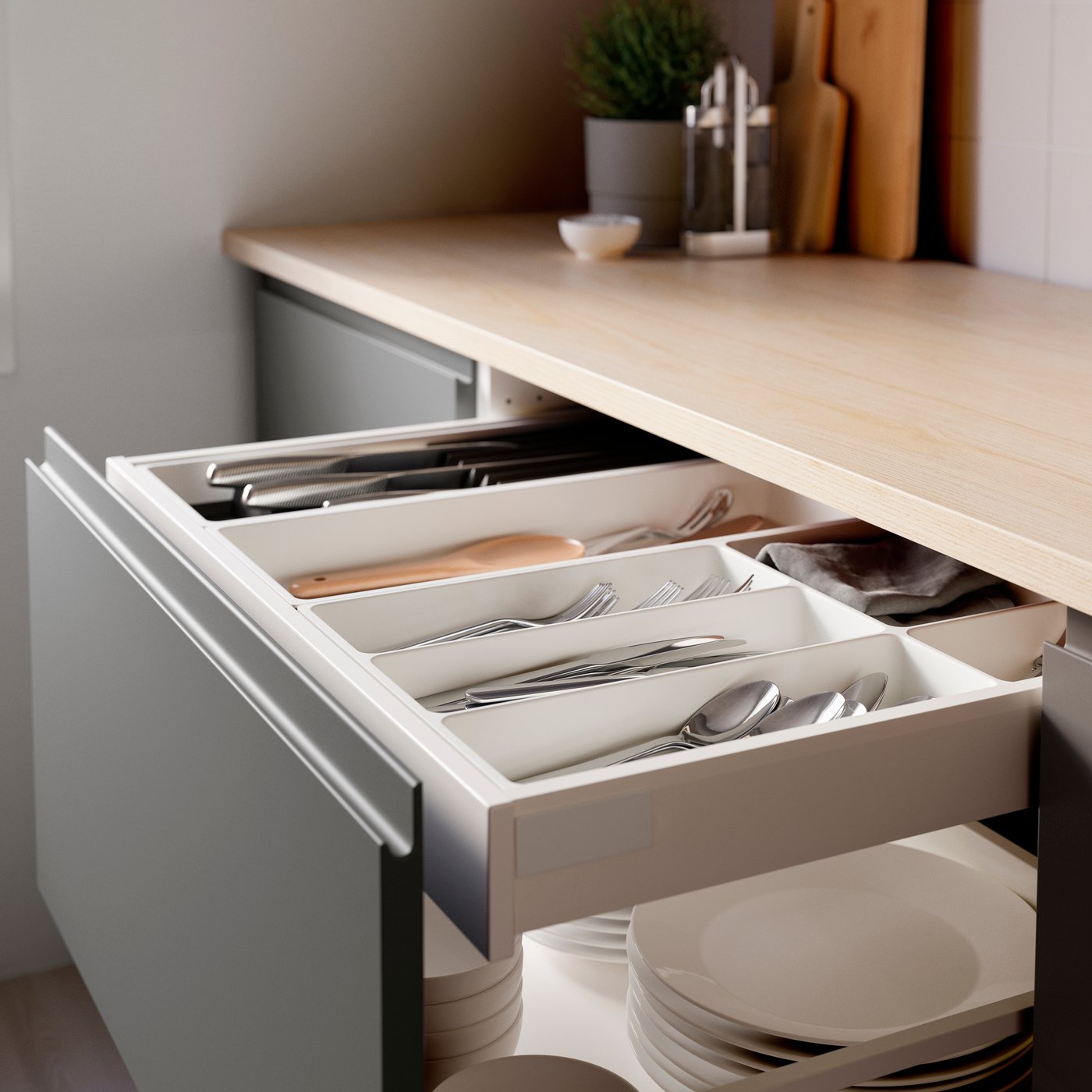 A white UPPDATERA cutlery tray in the kitchen