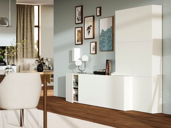 A living room with a white BESTÅ storage system.