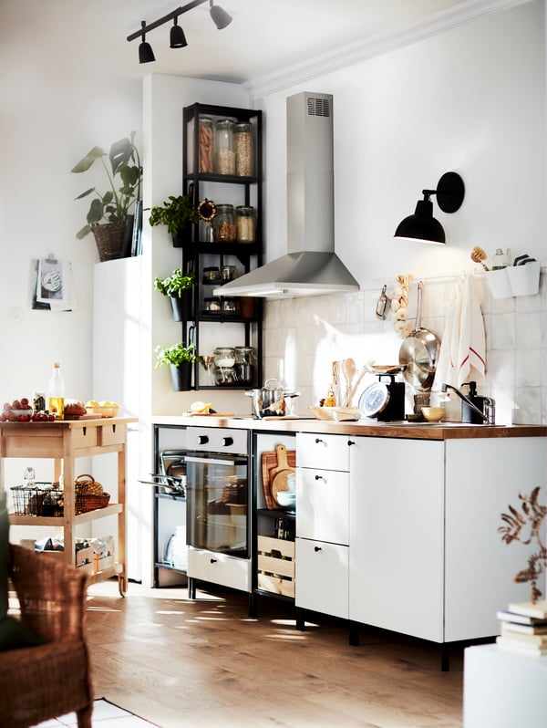A black SKURUP table/wall uplighter in the kitchen
