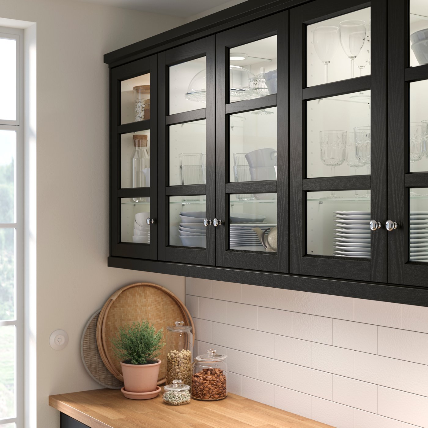 A black stained LERHYTTAN glass door