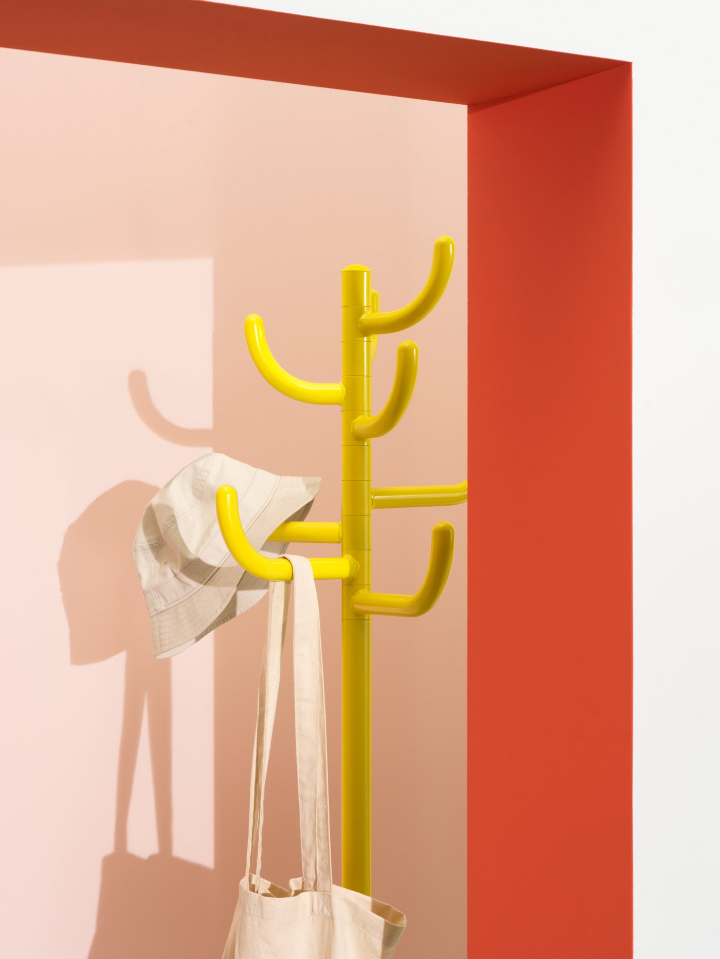An yellow BONDSKÄRET hat and coat stand