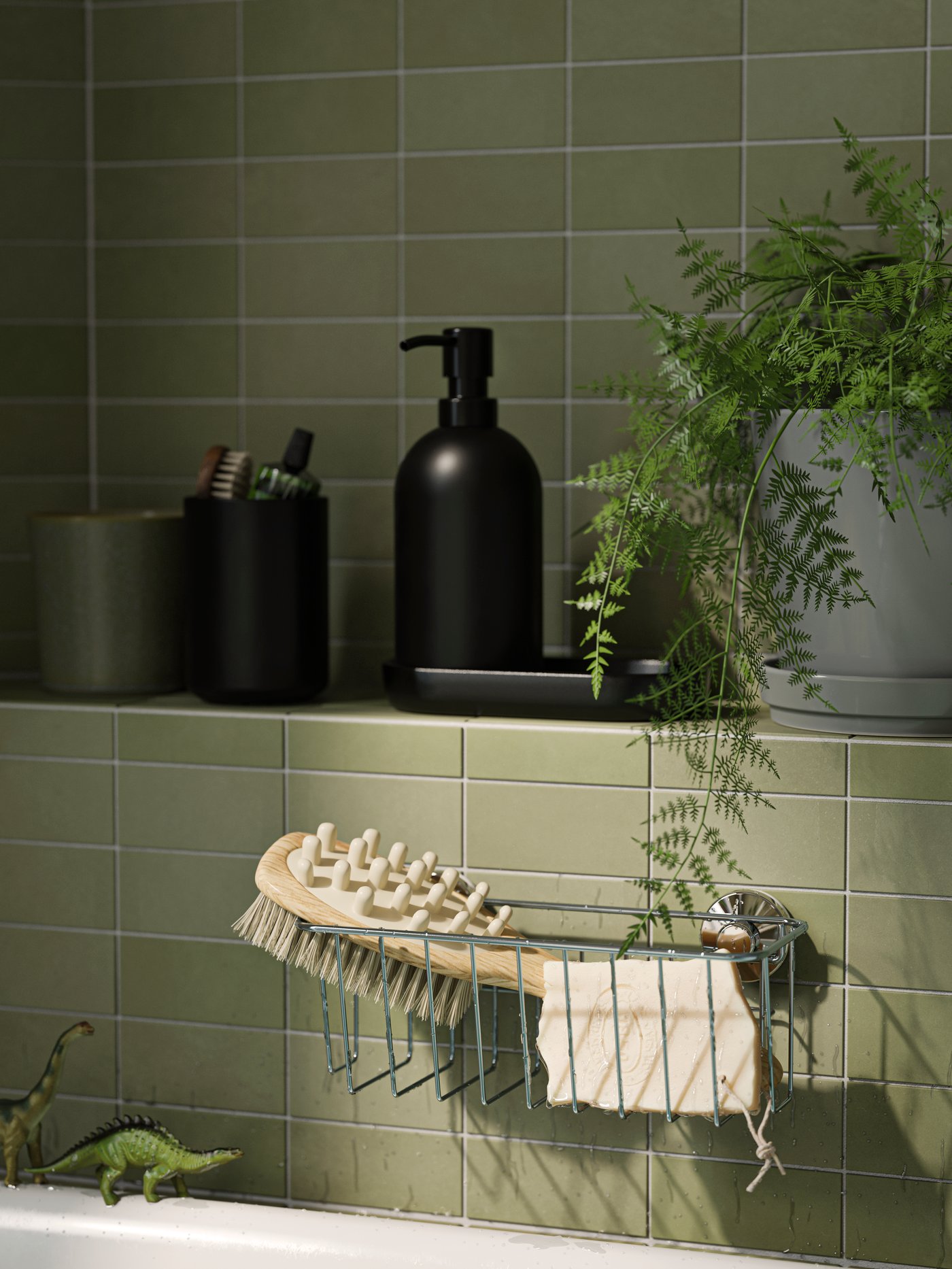 A black GANSJÖN 3-piece bathroom set in the bathroom