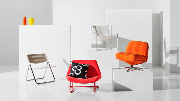A Kelinge orange DYVLINGE swivel armchair