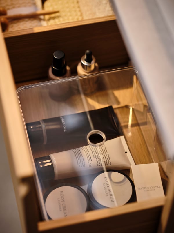 An oak effect ÄNGSJÖN wash-stand with drawer in the bathroom