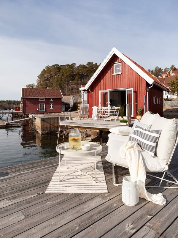 A beige KROKHOLMEN coffee table, outdoor