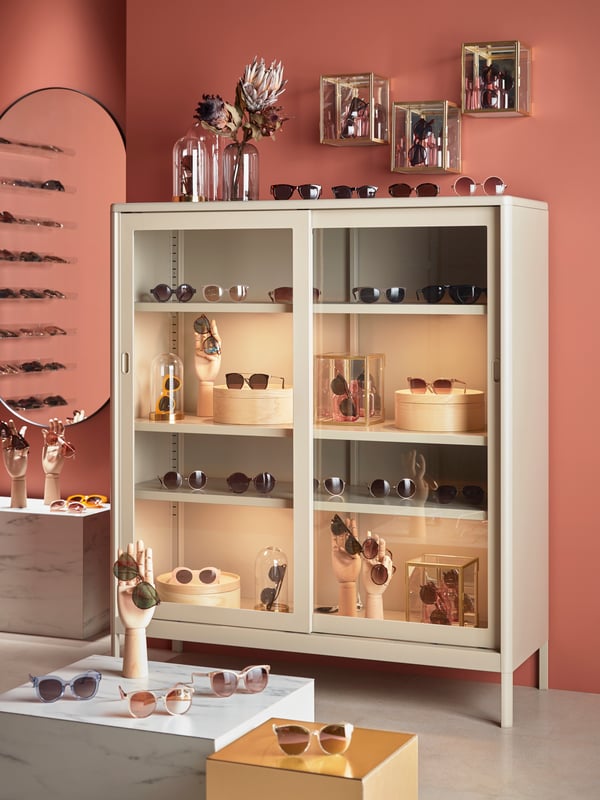 Shop with glass-door cabinet, jar with lid, extendable table and clamp spotlight