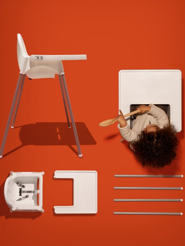 An ANTILOP high chair is dissected into various components, including a chair that a child is sitting on.
