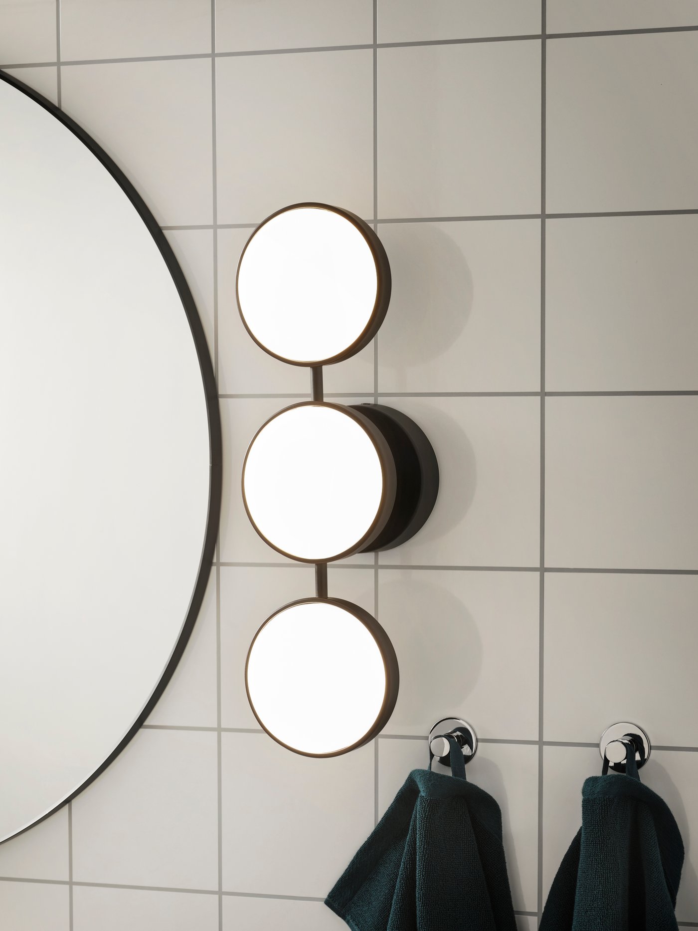 A dimmable matt/black KABOMBA LED wall lamp