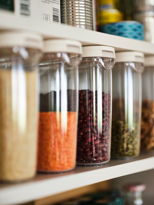 A transparent/white IKEA 365+ dry food jar with lid