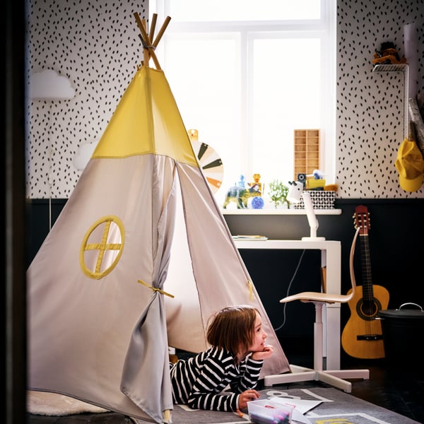 A birch/white SIBBEN children's desk chair in the childrens room