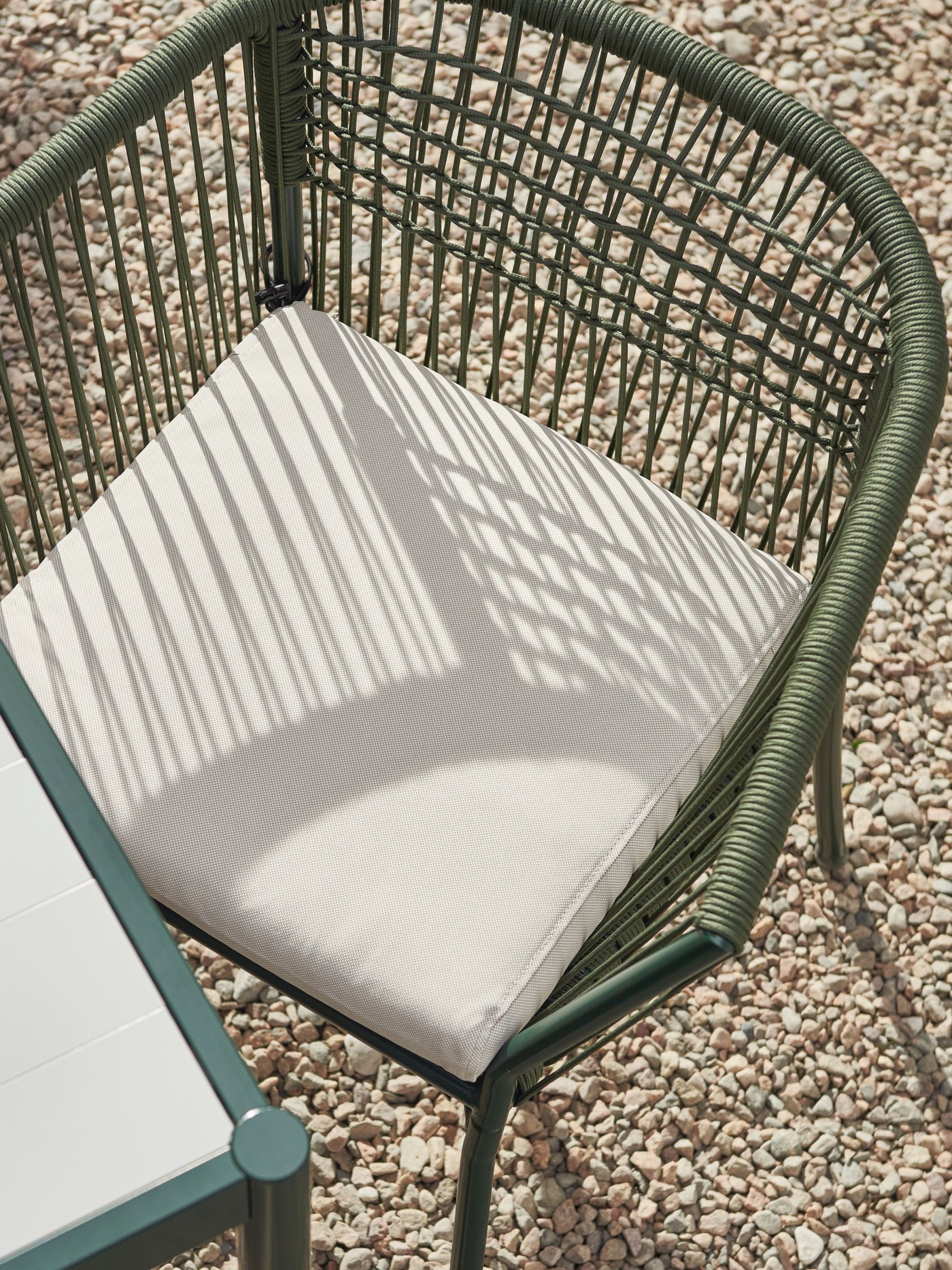 A dark green/light grey SEGERÖN table, outdoor outside