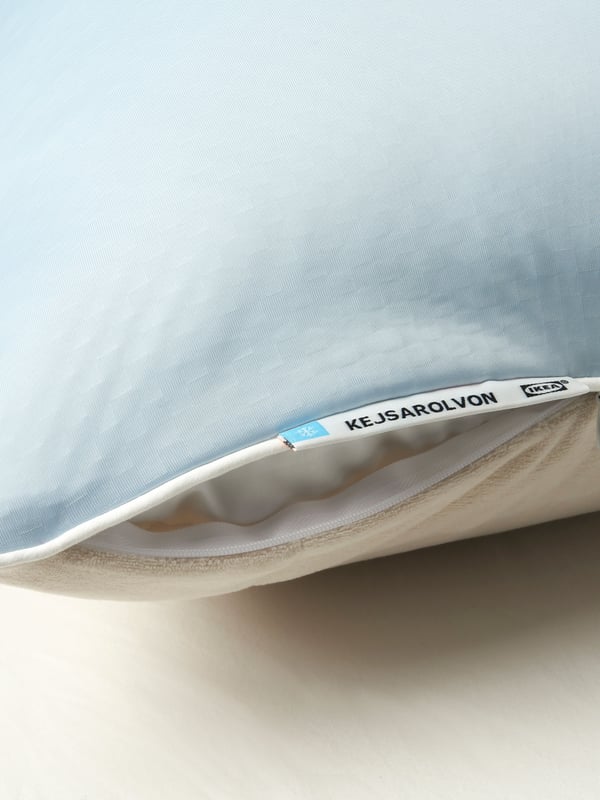 A beige/blue KEJSAROLVON pillow protector