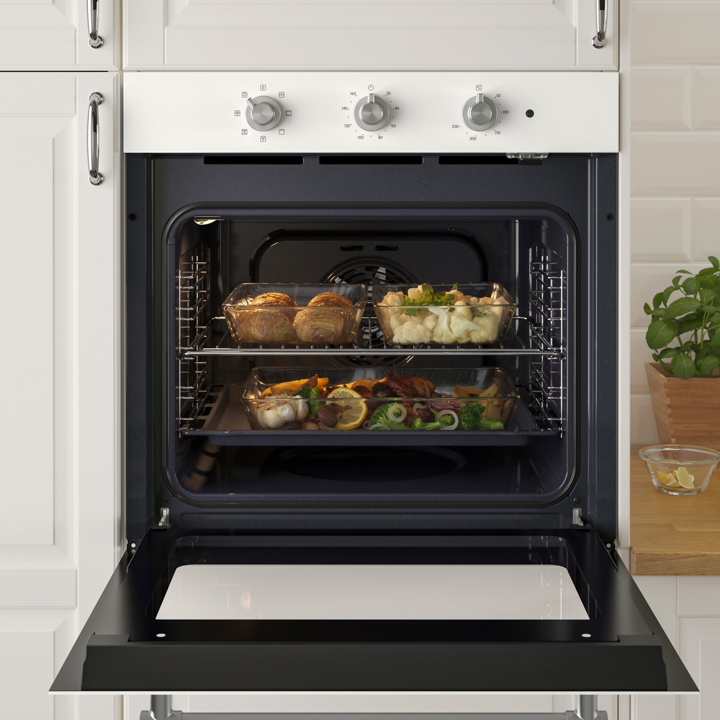 An IKEA 300 white MATTRADITION forced air oven in the kitchen.