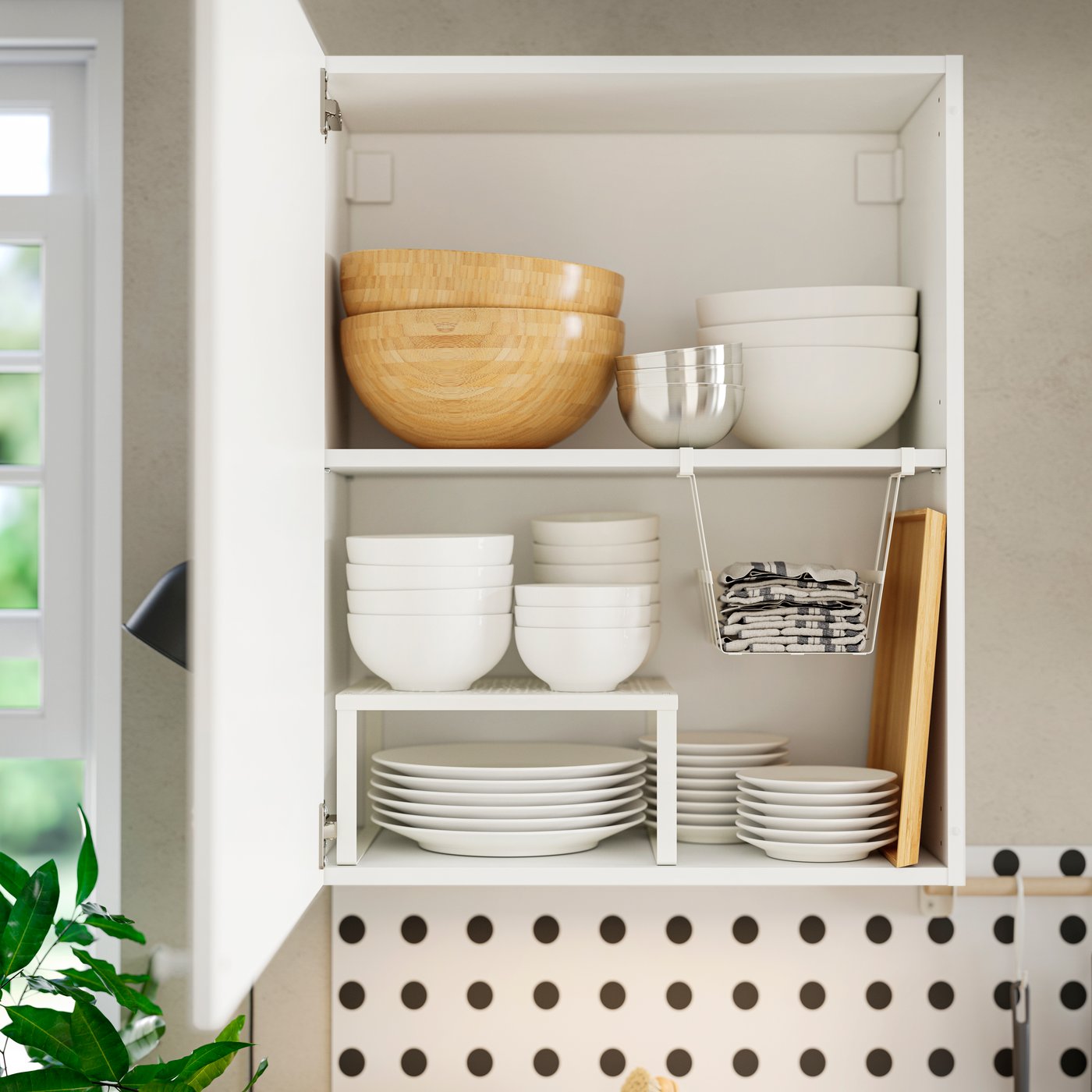 A white KNOXHULT wall cabinet with door