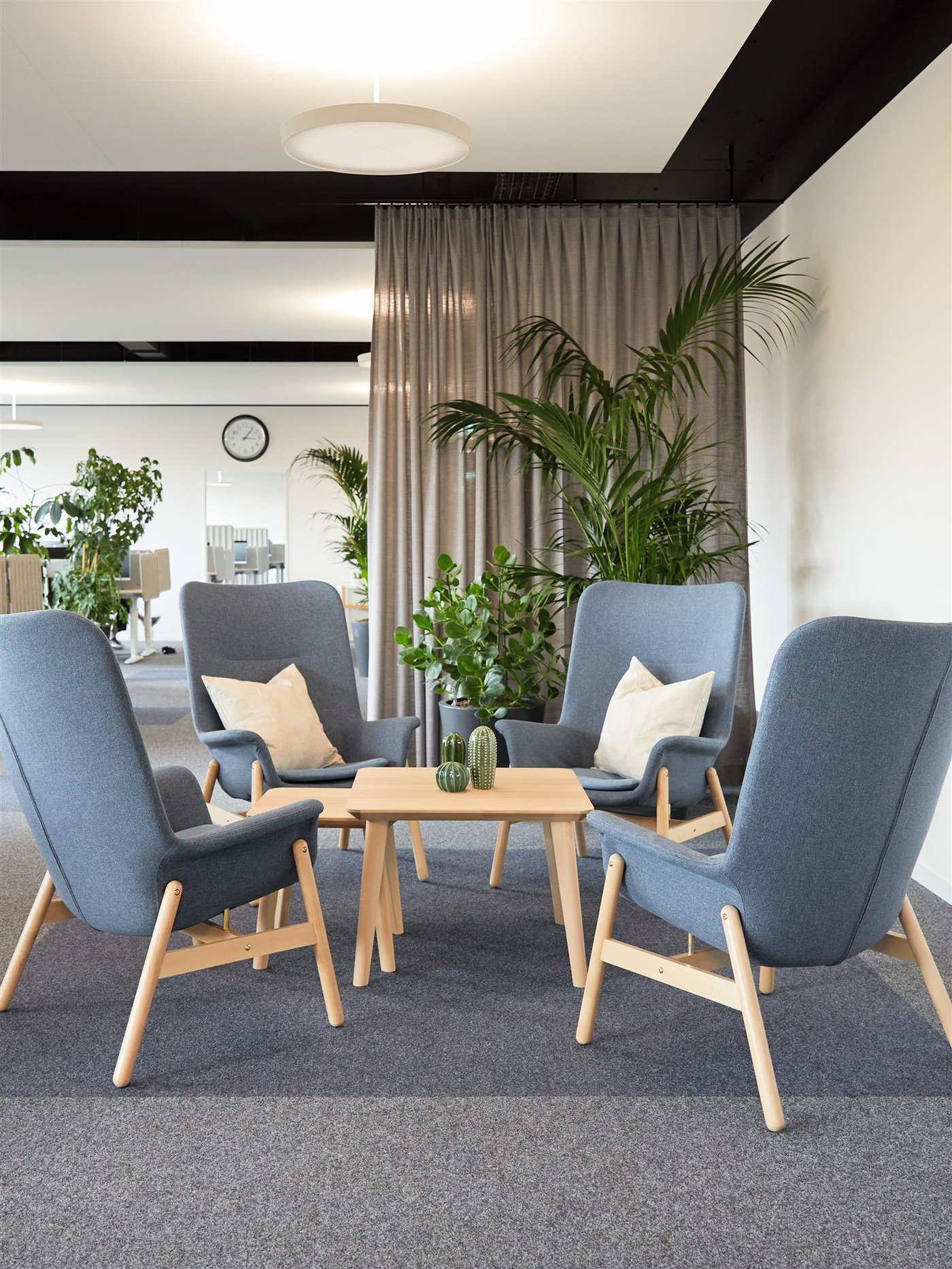 Armchairs and LISABO coffee table in an office in Singapore
