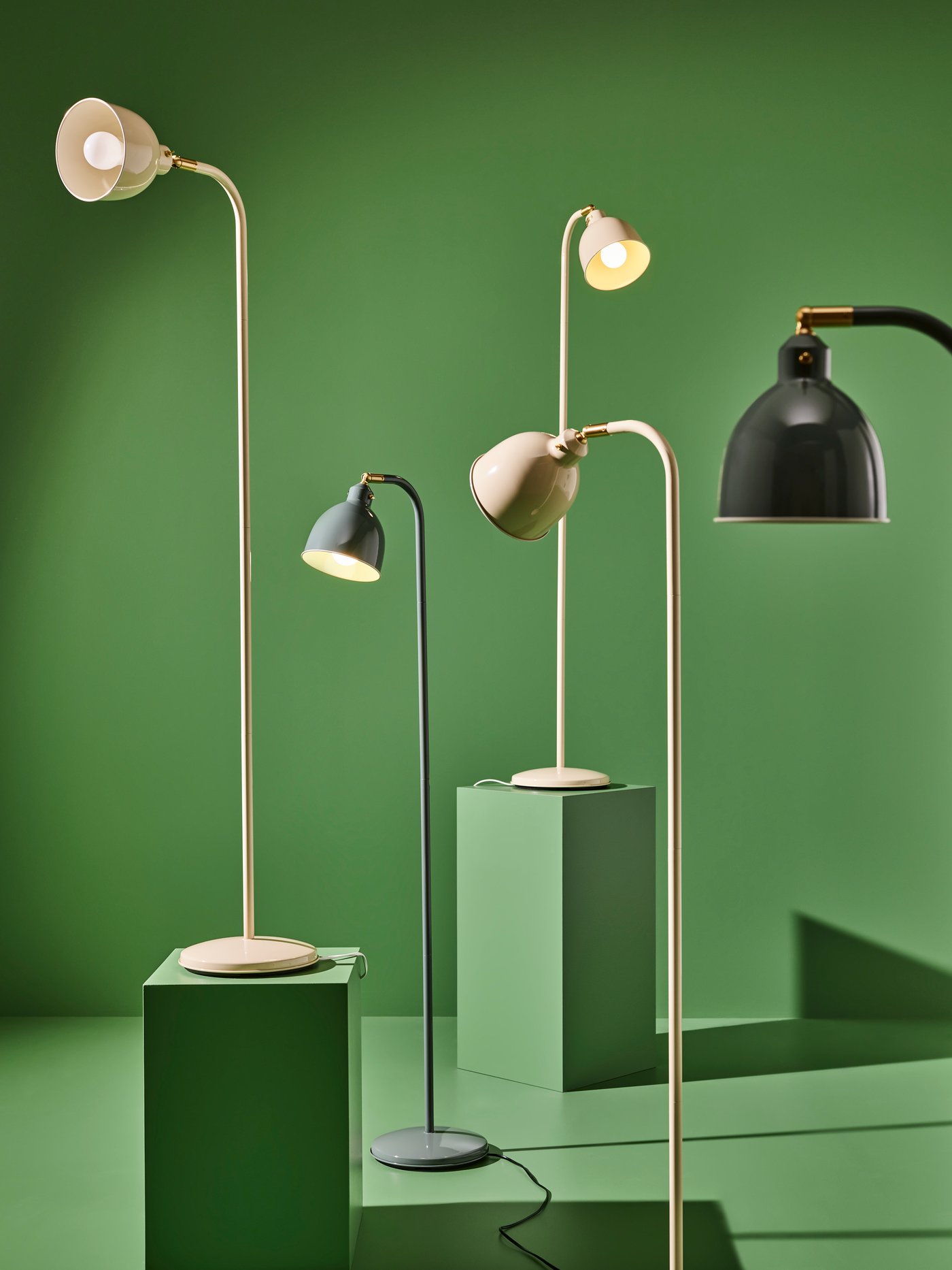 A light beige RÖDFLIK floor/reading lamp