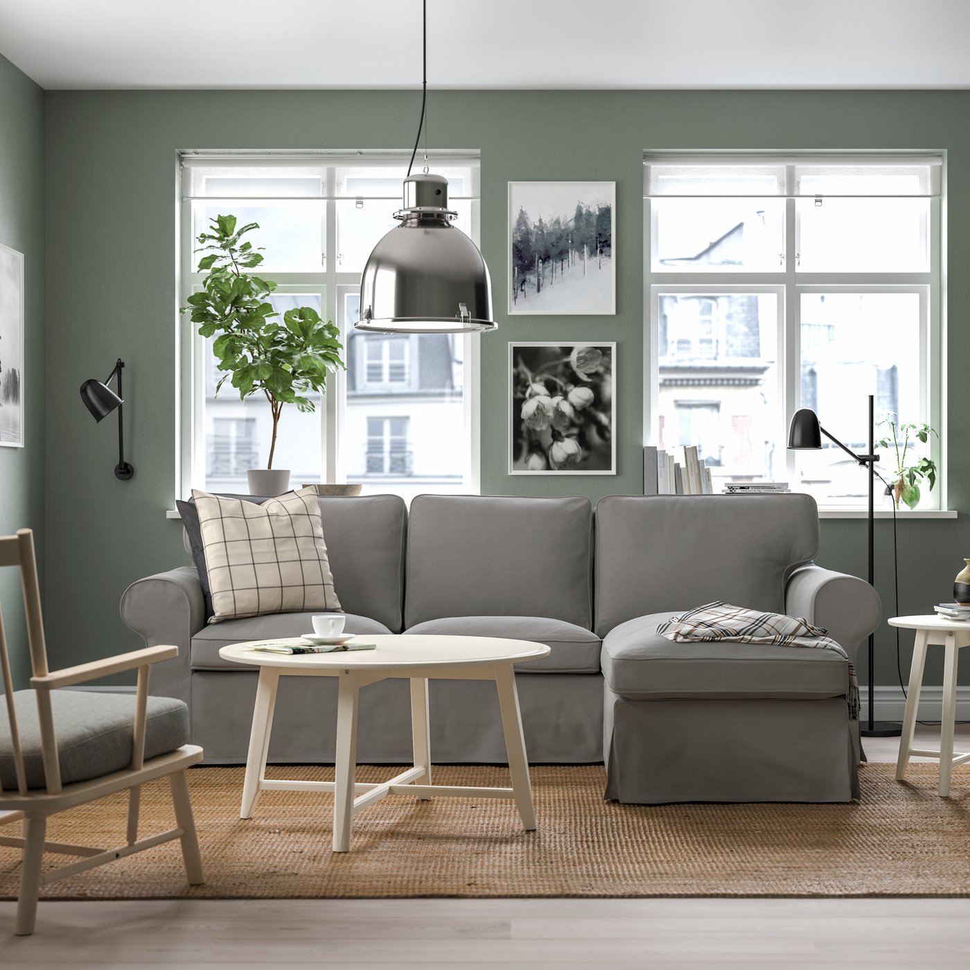 A Hakebo dark grey EKTORP 3-seat sofa with chaise longue