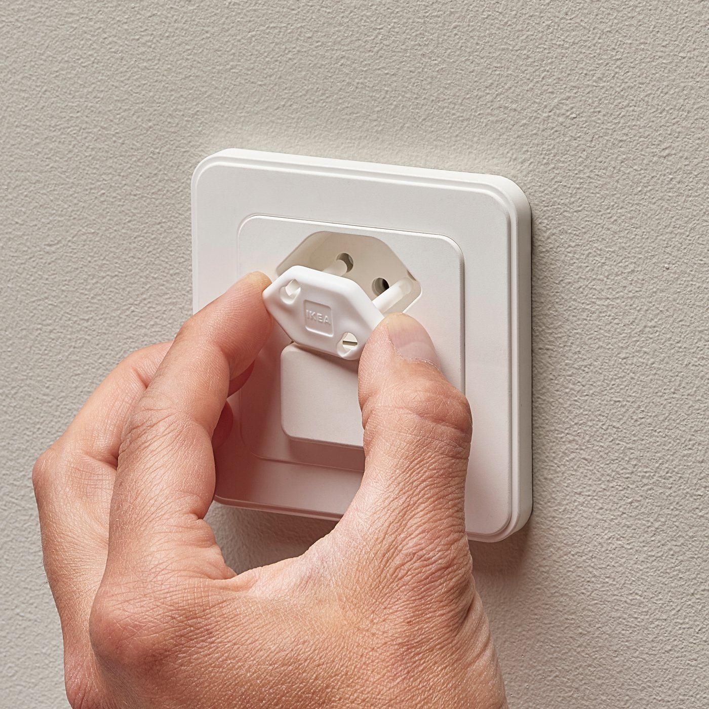 Un obturateur de prise PATRULL blanc