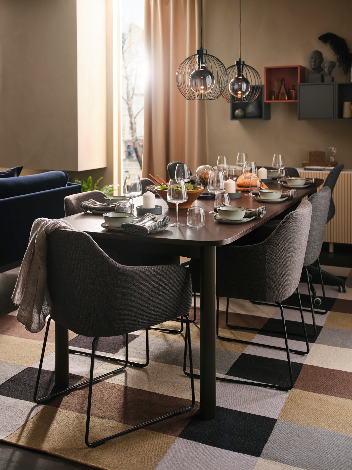 Gray upholstered chairs with a set table
