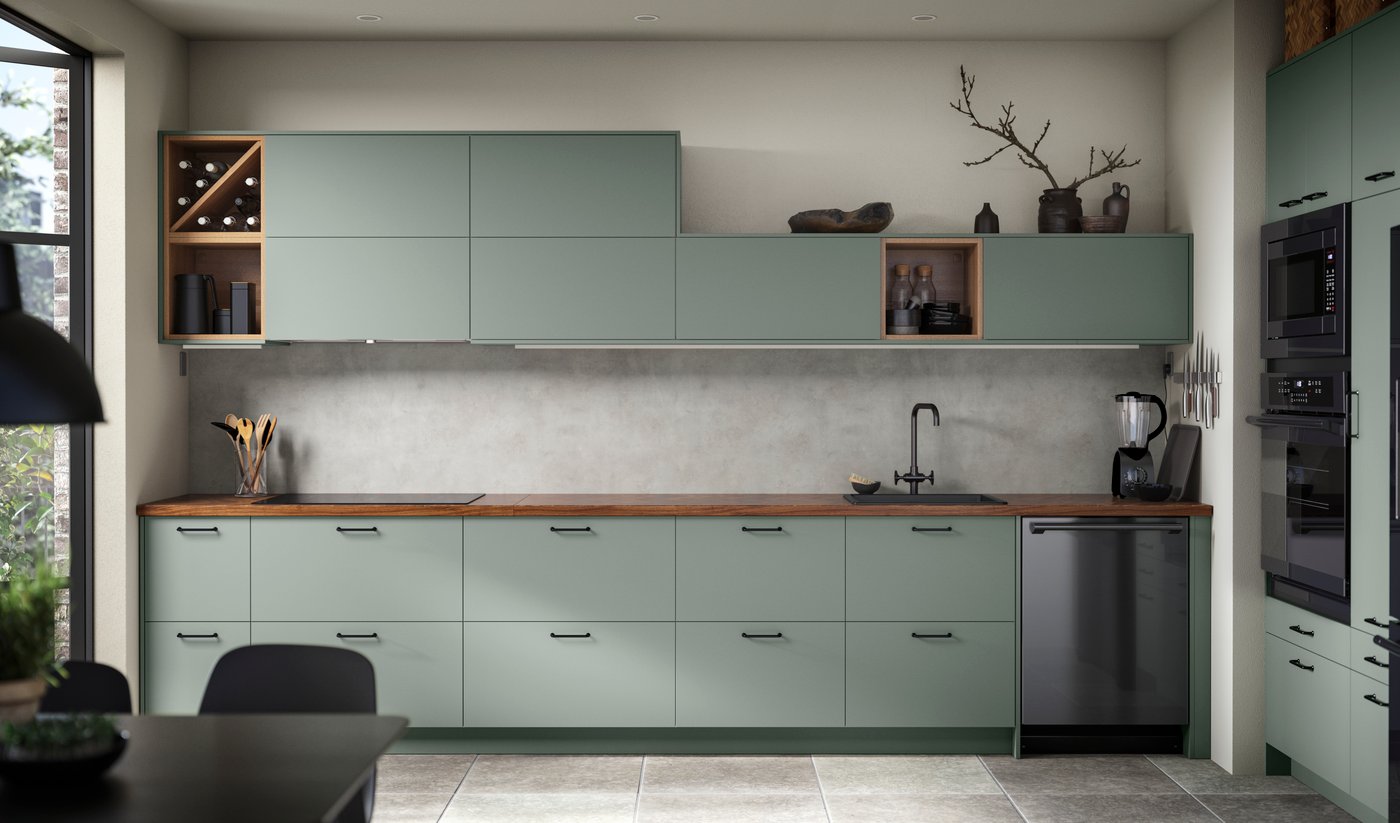 A grey-green BODARP drawer front in the kitchen