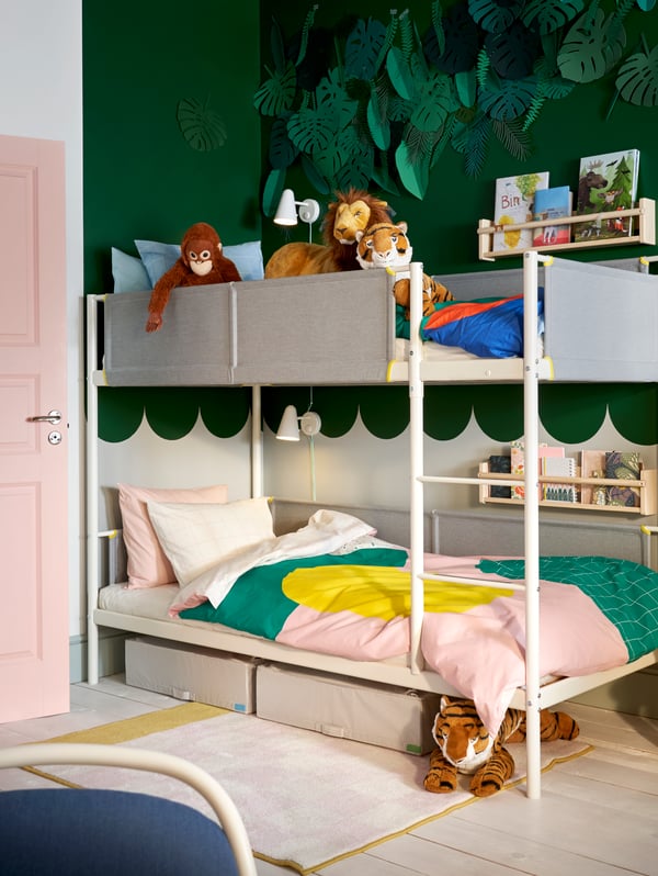 A light white stained pine FLISAT wall storage in the childrens room