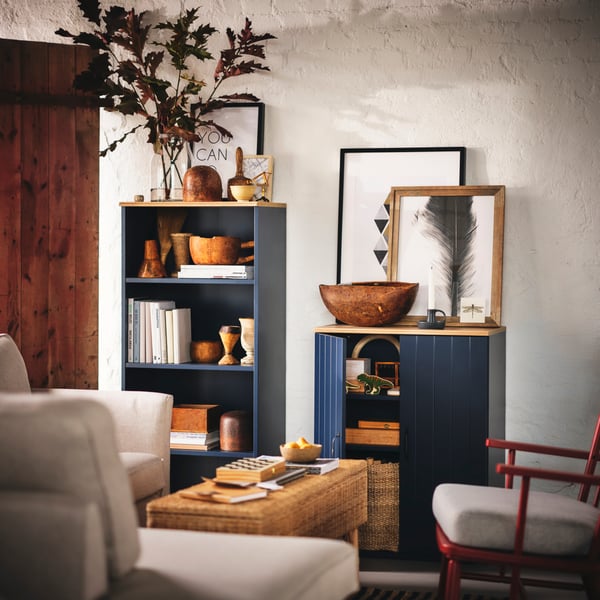 A black-blue SKRUVBY bookcase