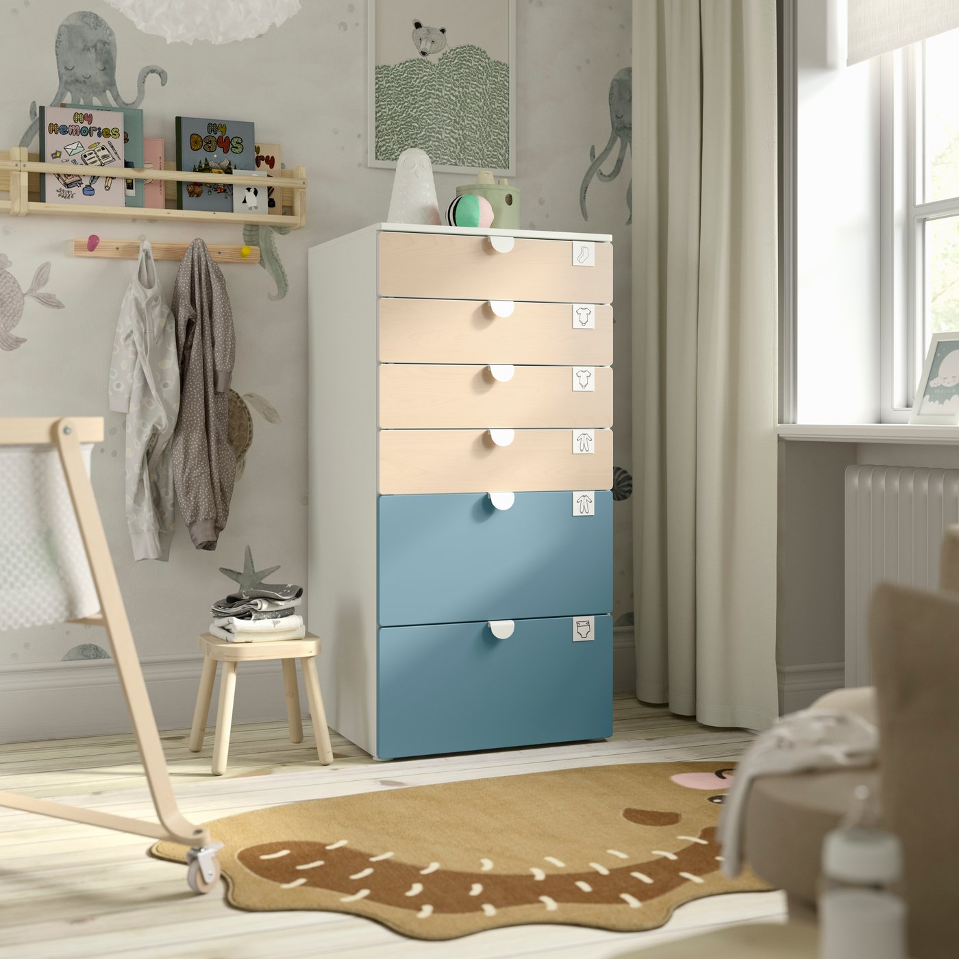 A white birch/blue PLATSA chest of 6 drawers in the childrens room