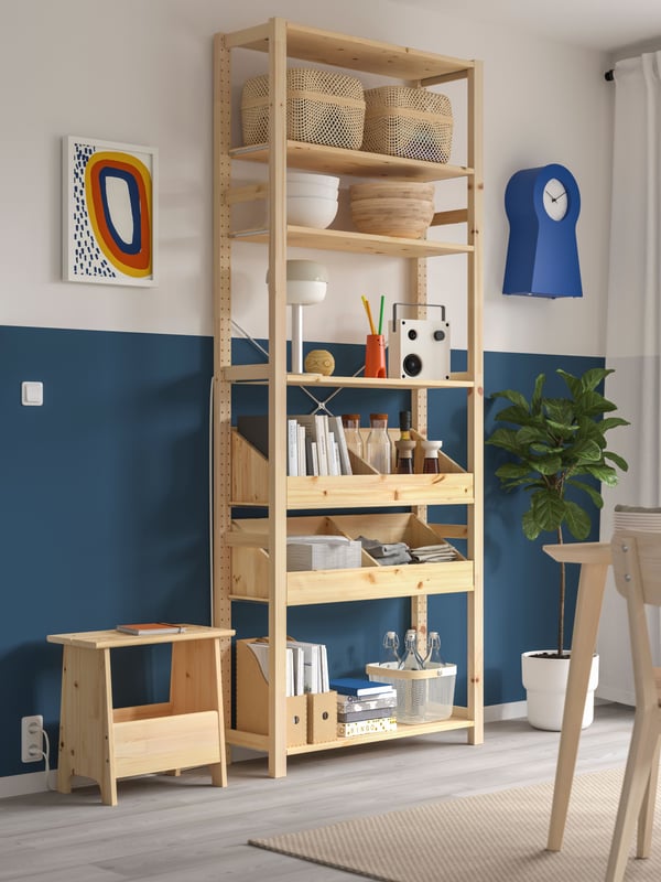 A with 2 box shelves/pine IVAR shelving unit in the dining room