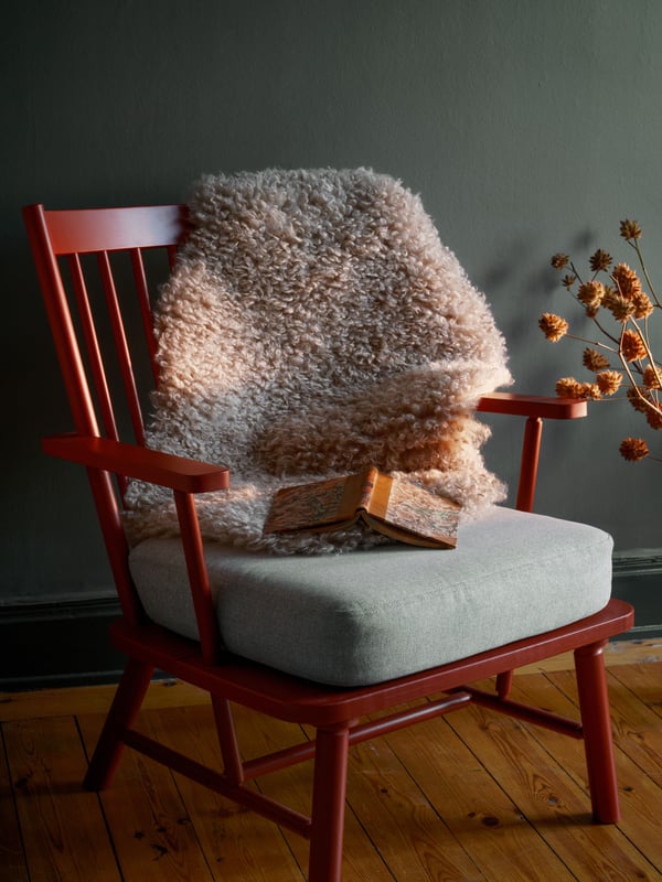 A brown-red/Tibbleby beige/grey PERSBOL armchair in the dining room