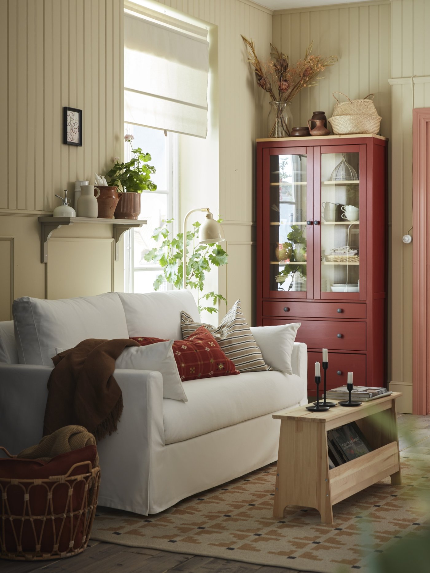 A pine PERJOHAN bench with storage in the living room