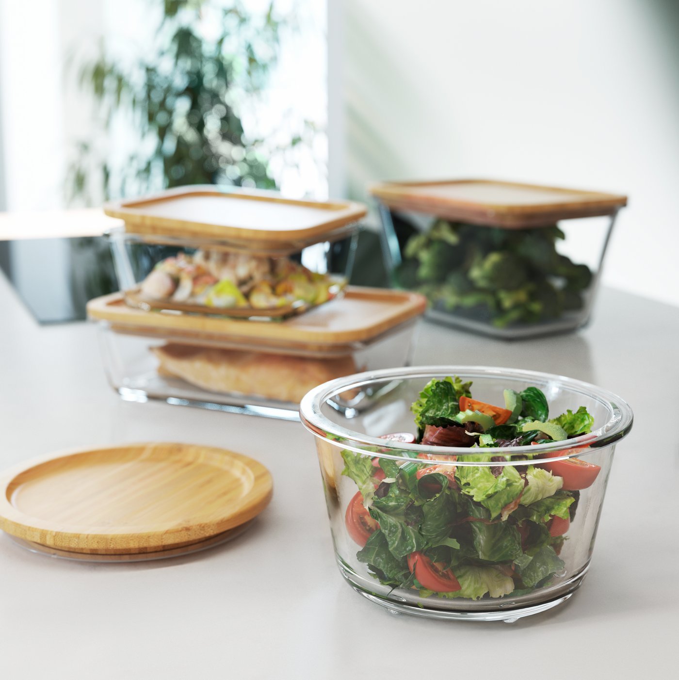 A round/glass IKEA 365+ food container in the kitchen
