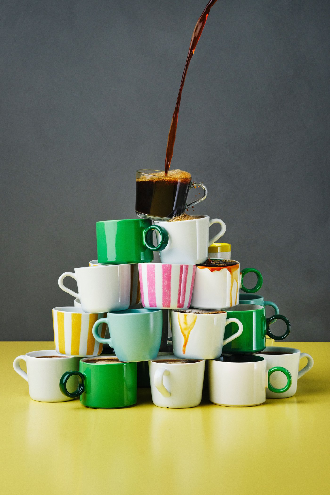 A white/green PIGGÅL mug