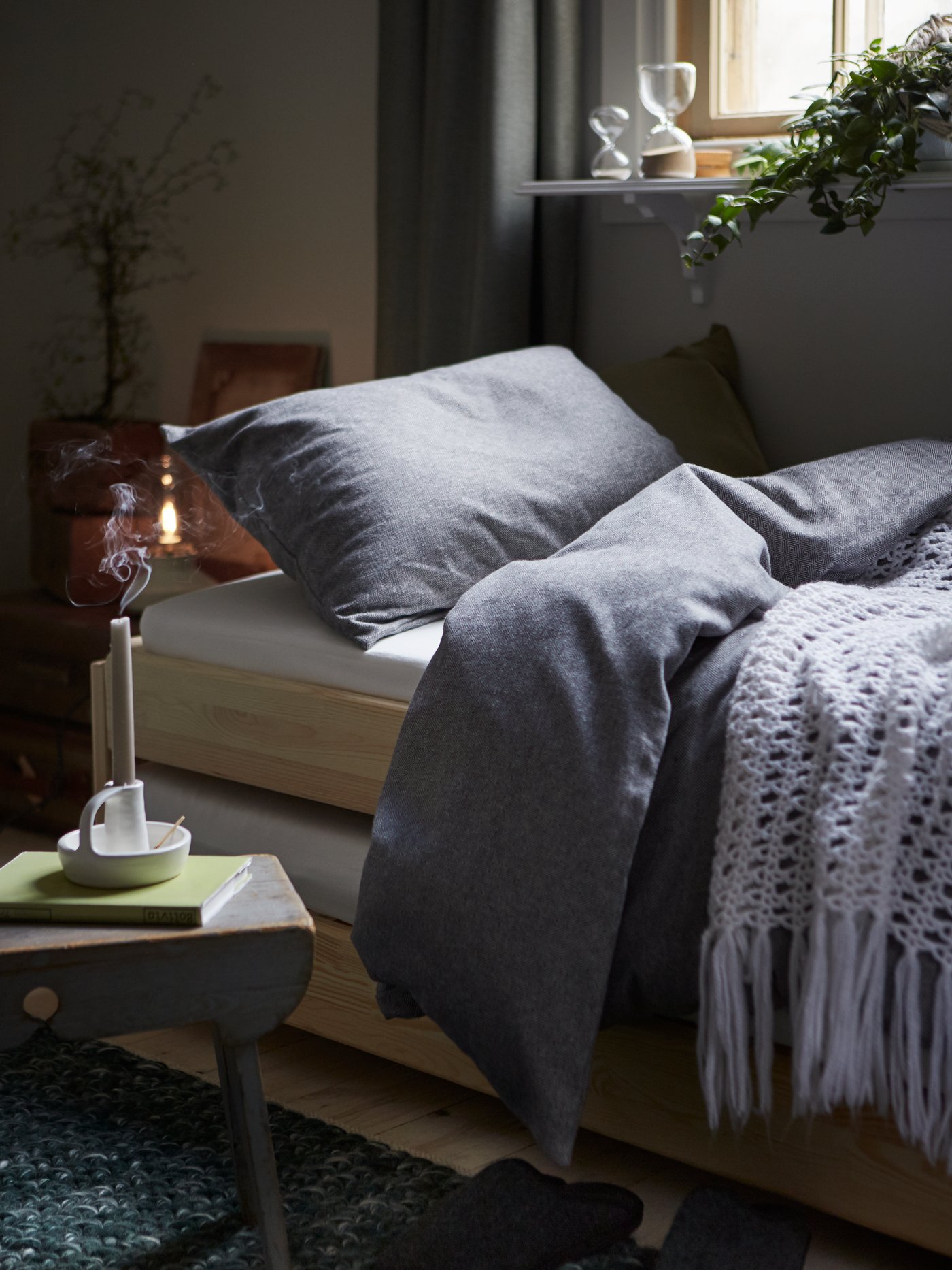 A pine UTÅKER stackable bed