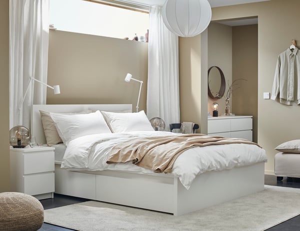 A white MALM chest of 2 drawers in the bedroom