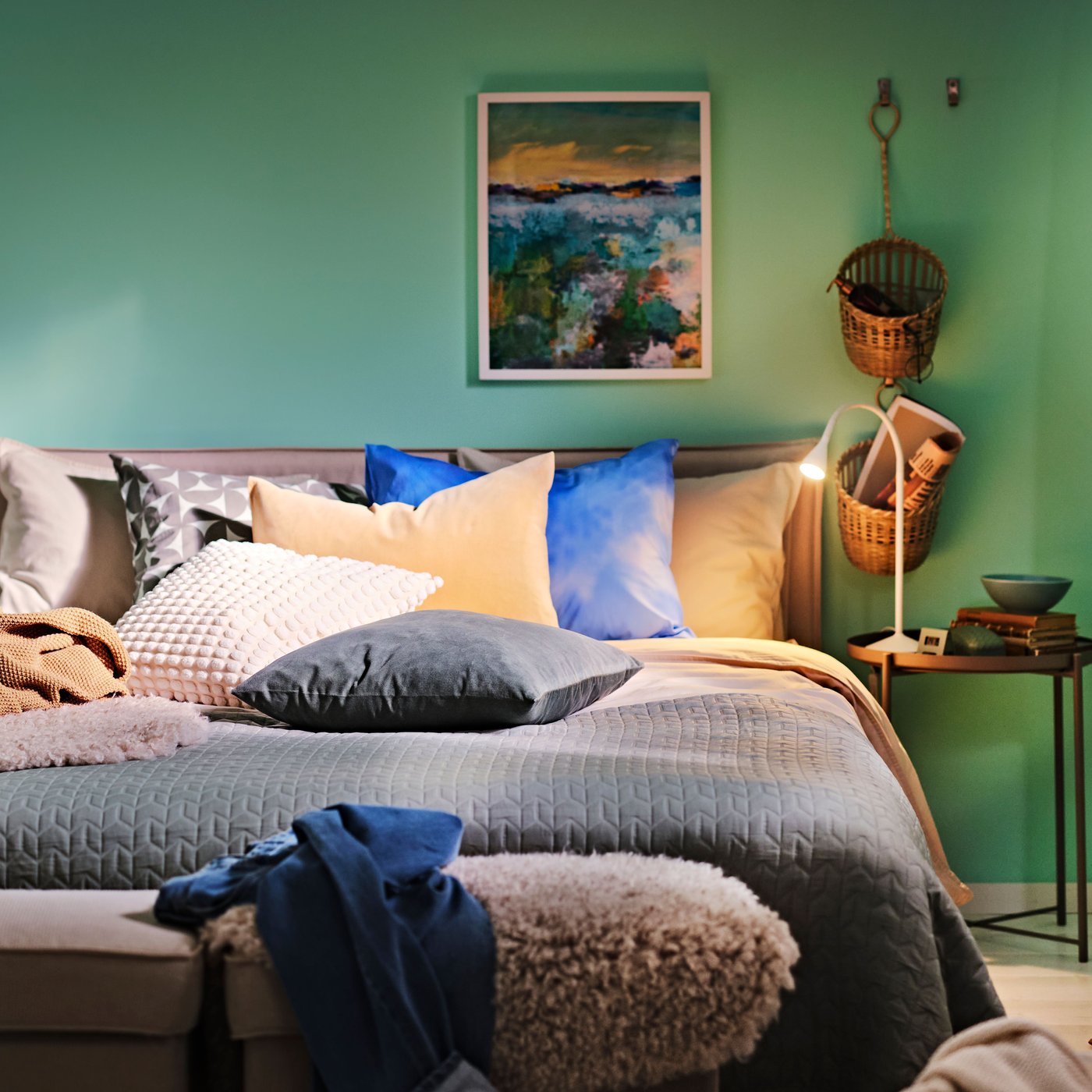 A grey-green KÖLAX bedspread