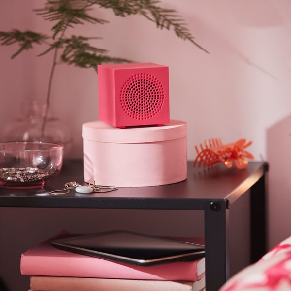 A pink KALLSUP portable Bluetooth speaker in the NA