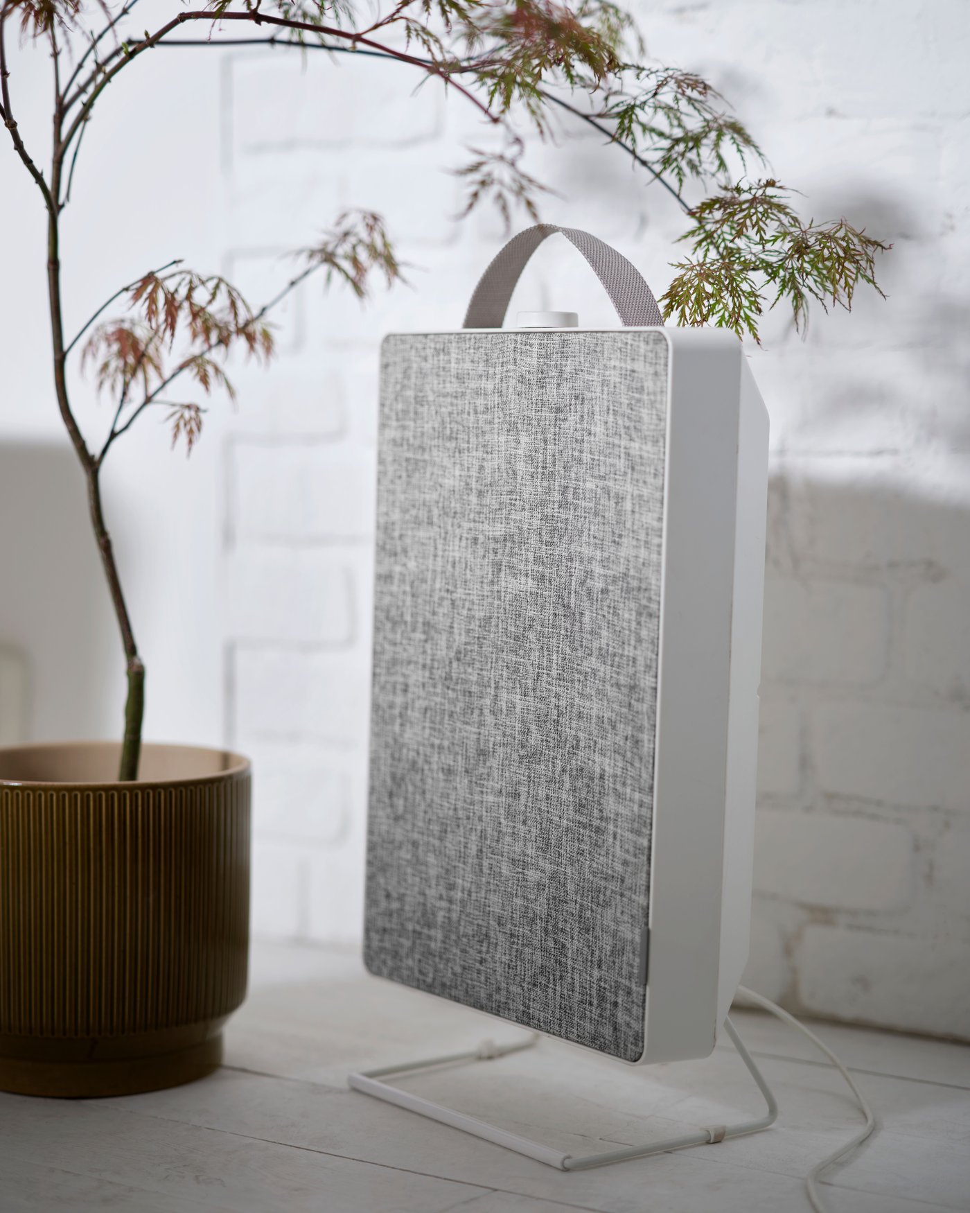 A white FÖRNUFTIG air purifier in the NA