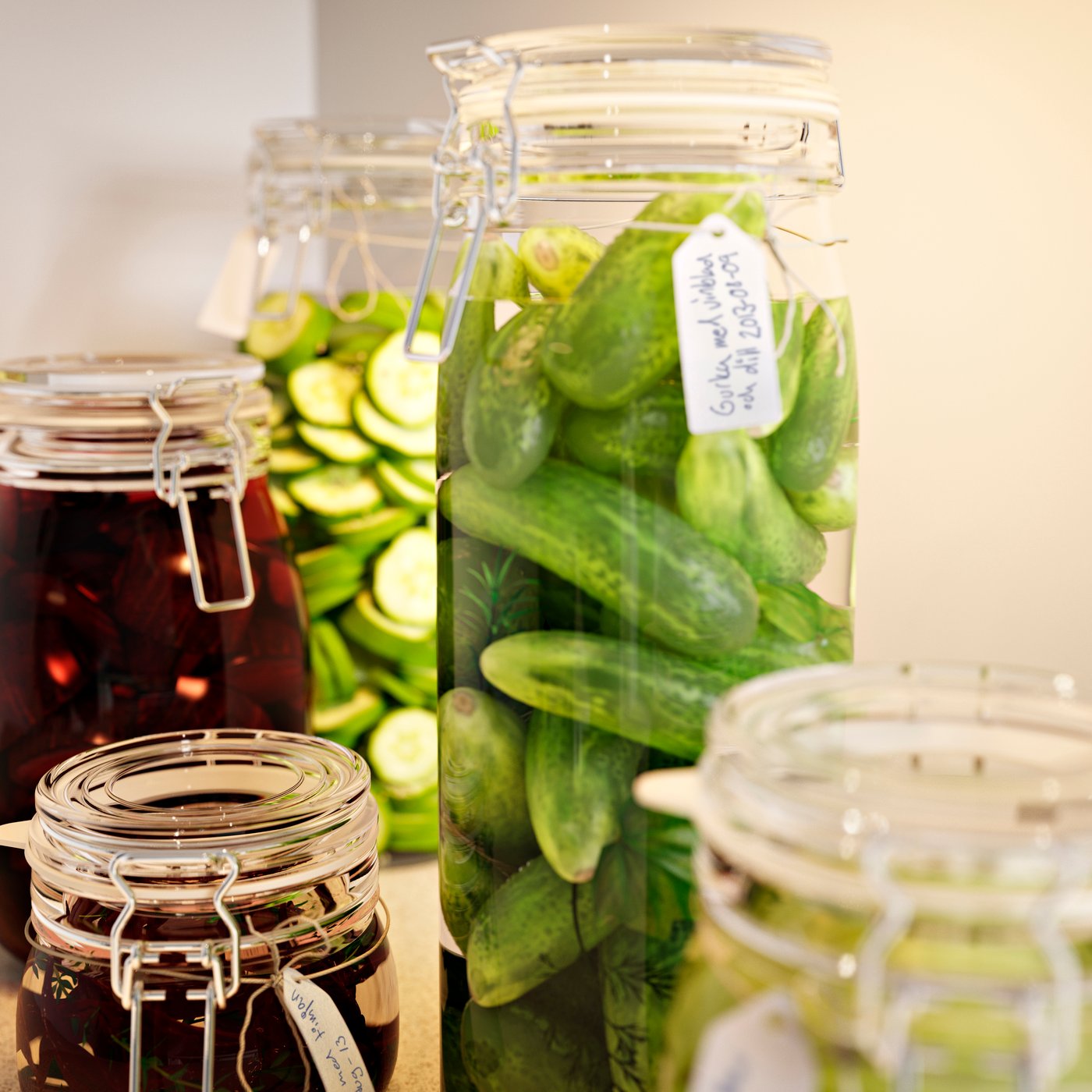 A clear glass KORKEN jar with lid