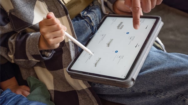 Close-up of a person browsing IKEA.com on a tablet.