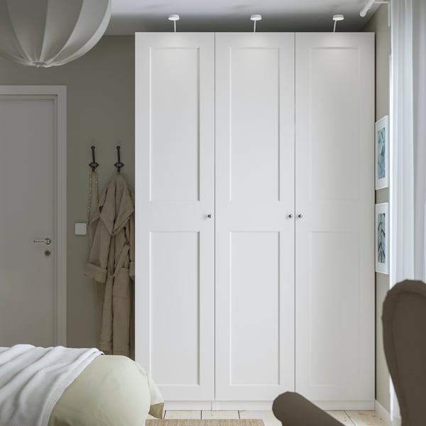 A white/dimmable YTBERG cabinet lighting in the bedroom