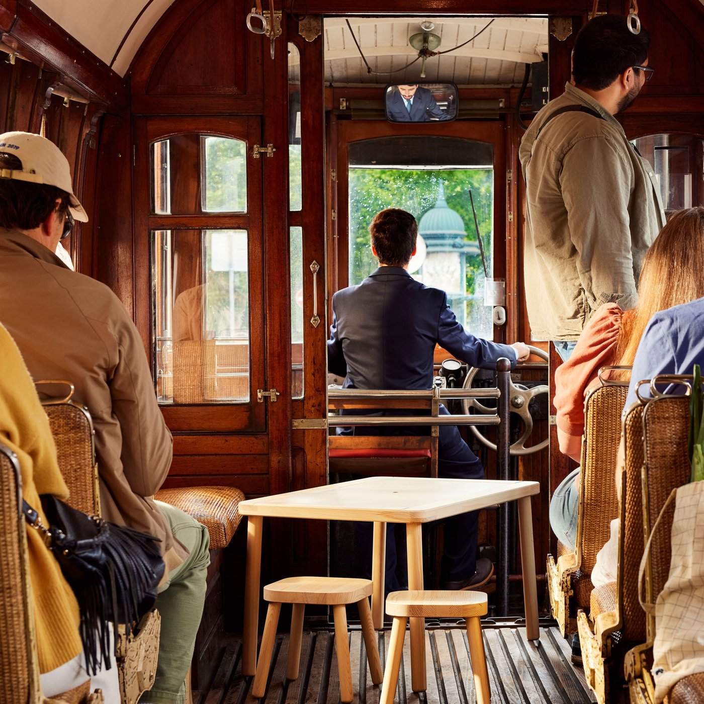 People on a public transport selling used furnitures.